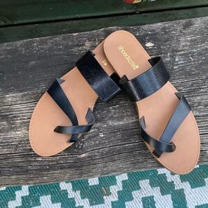Black flat sandals
